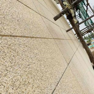 内蒙古 黄金麻花岗岩荔枝面外墙干挂石材效果示例