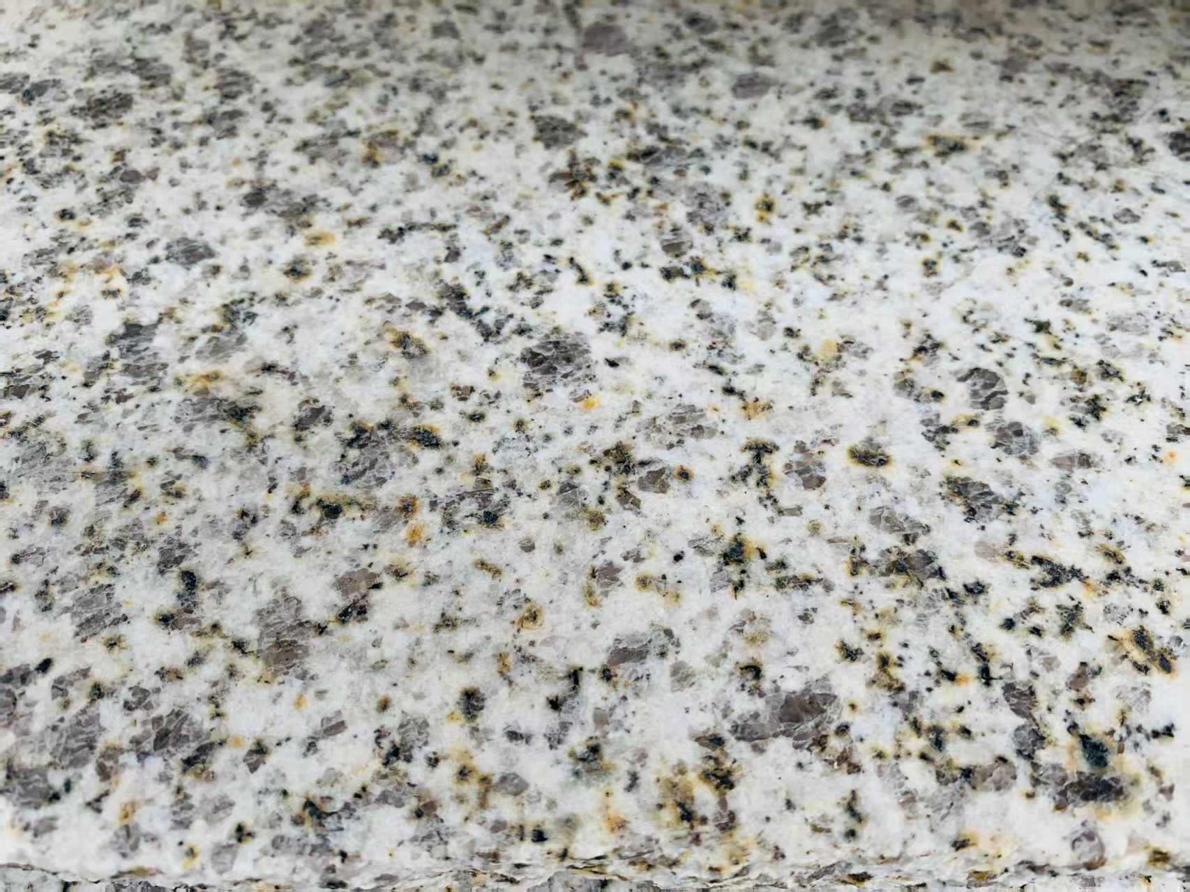 内蒙古 黄金麻花岗岩石材浅黄光面