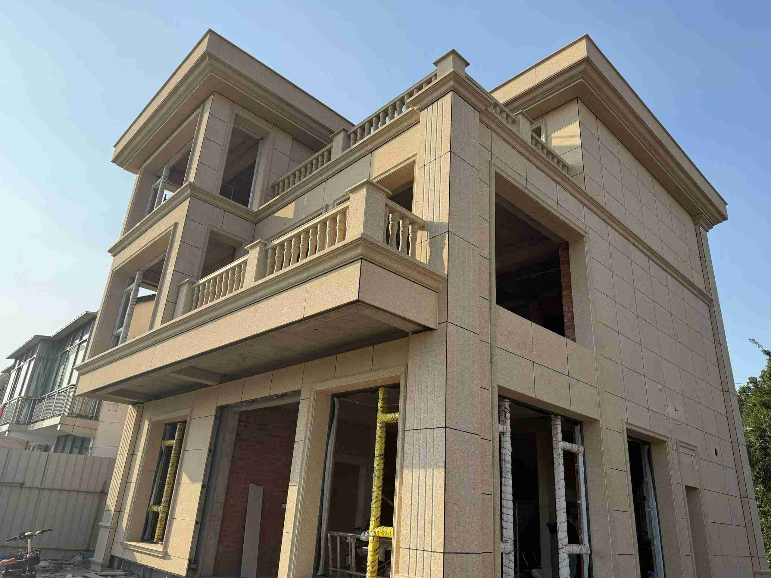 内蒙古 黄金麻花岗岩石材荔枝面外墙干挂效果展示